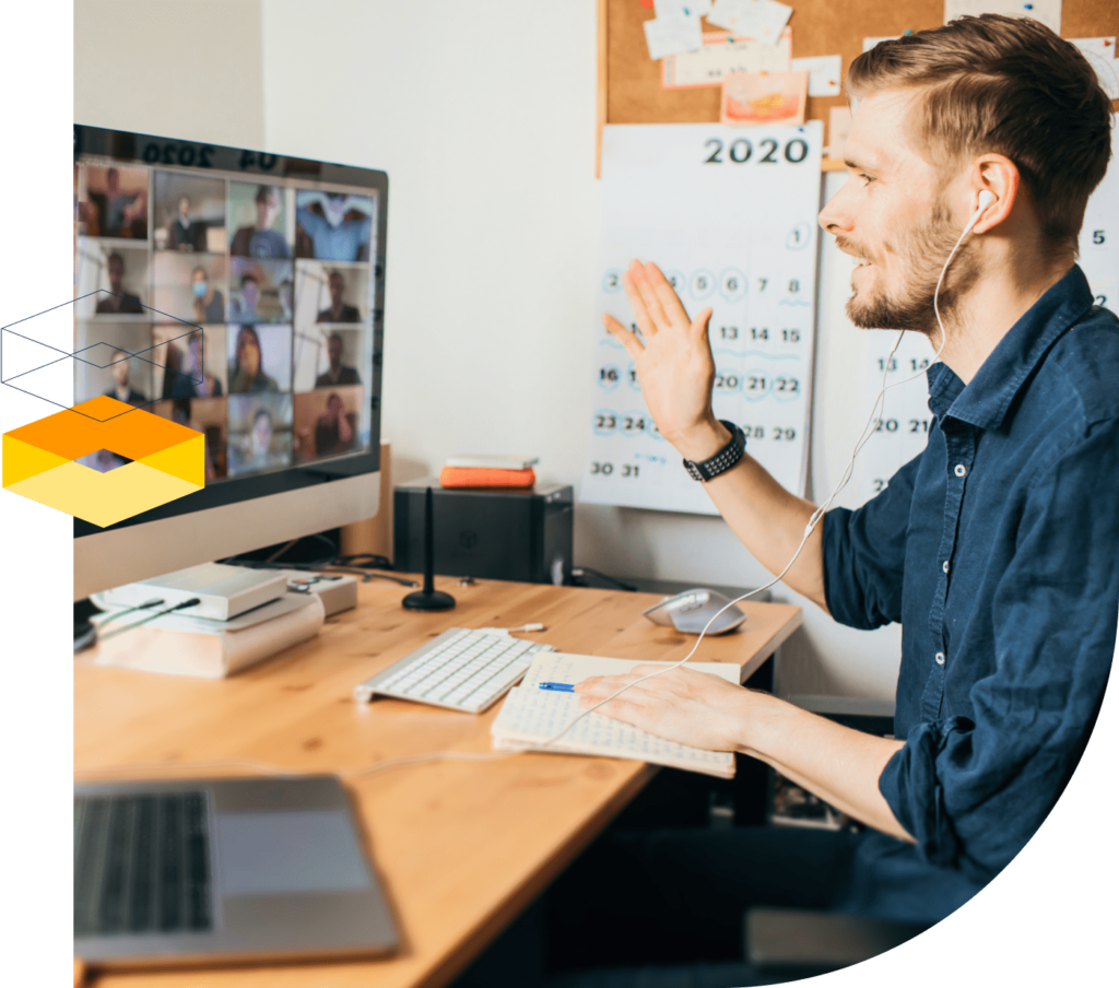 man waving at computer chat