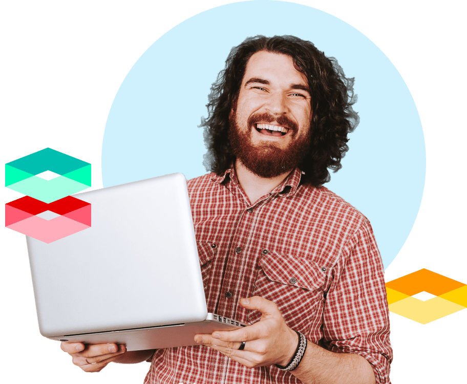 Man smiling with laptop