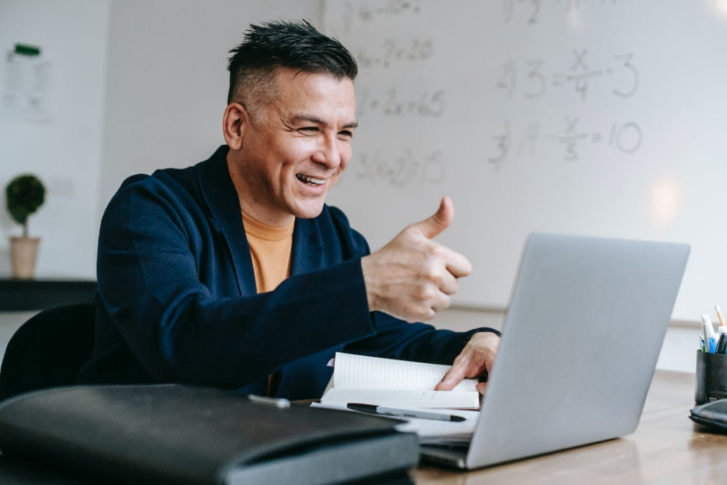 Man giving a thumbs up to the remote tech team