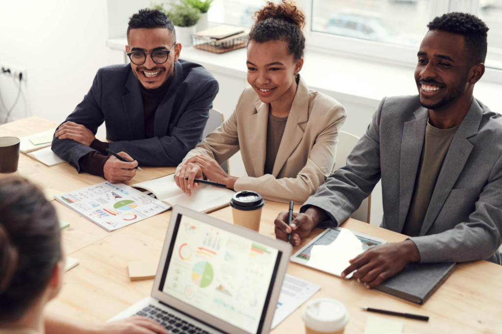 Four people in a conference room