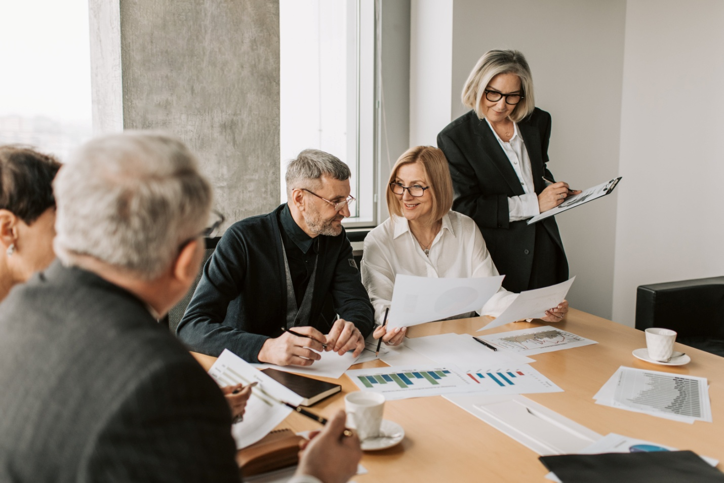 People reviewing documents in an office